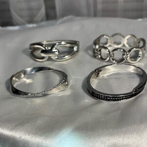 Paparazzi set of Elegant Silver Bracelets. All 4 bracelets for one price.